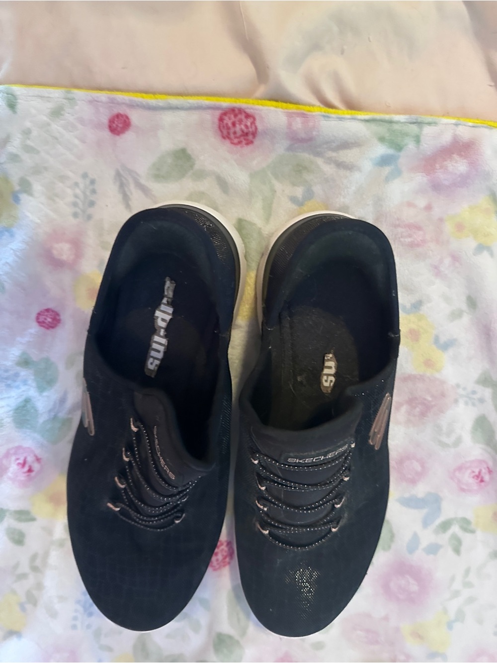 Skechers Women’s Black Slip-On Casual Sneakers with Rose Gold Accents